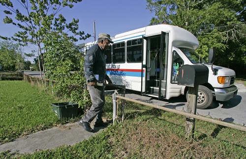 Senior boarding bus